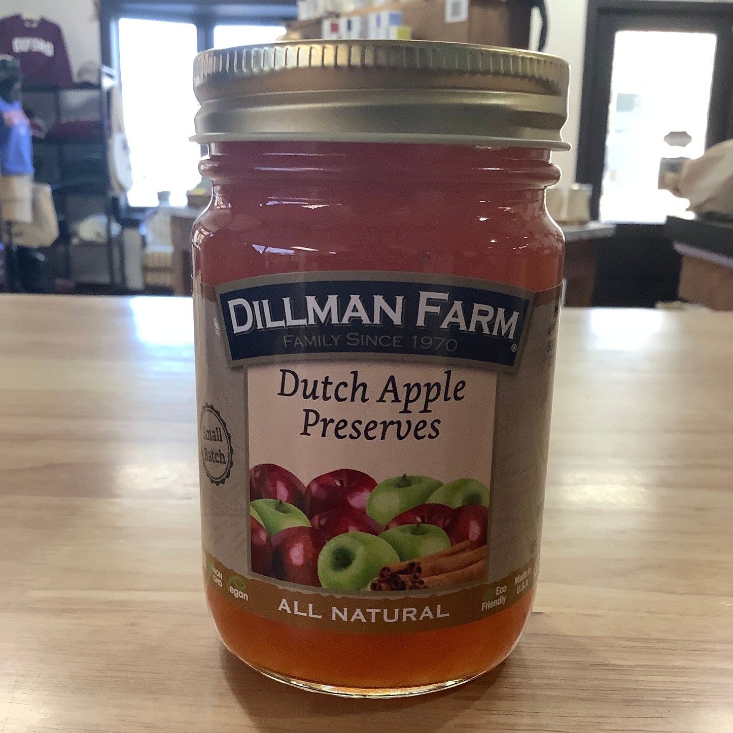 Jar of Dillman Farm Dutch Apple Preserves on a wooden surface